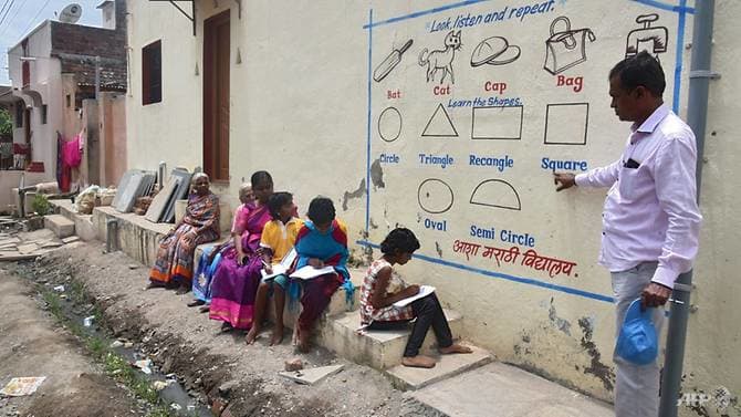 indian-school-paints-village-walls-for-outdoor-covid-19-pandemic-classes.jpg indian-school-paints-village-walls-for-outdoor-covid-19-pandemic-classes.jpg
