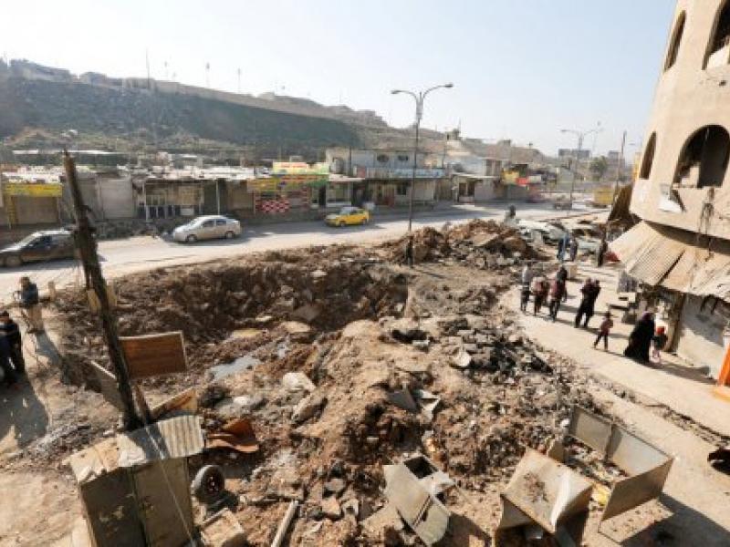 a-crater-made-by-an-airstrike-against-islamic-state-militants-is-pictured-in-mosul-iraq-february-3-2017-reutersahmed-saad.jpg