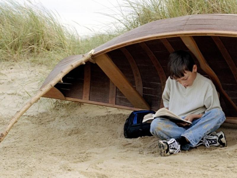 boy-reading-on-beach-011.jpg
