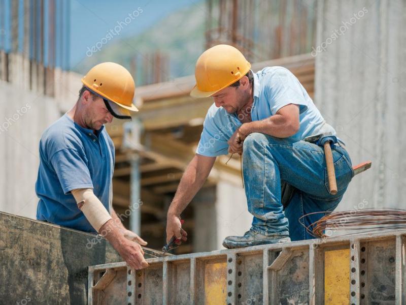 depositphotos_13797868-stock-photo-two-construction-workers-installing-concrete.jpg