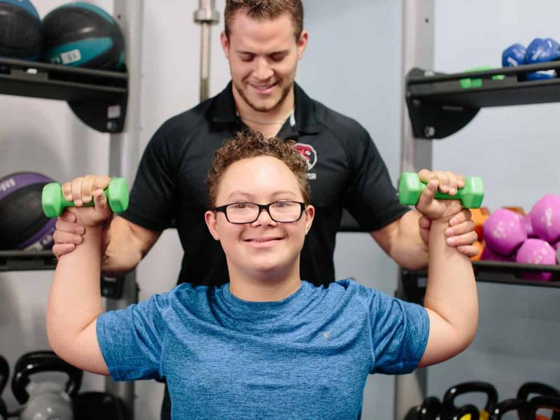 jude-overhead-press-down-syndrome-special-needs-autism-exercise.jpg