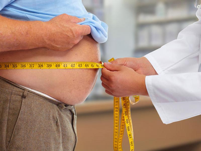 bigstock-doctor-measuring-obese-man-wai-111682115.jpg